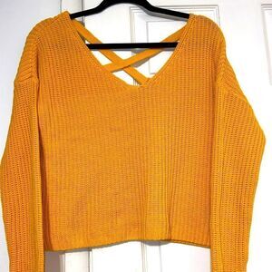 Divided bright yellow criss cross back sweater size meduim